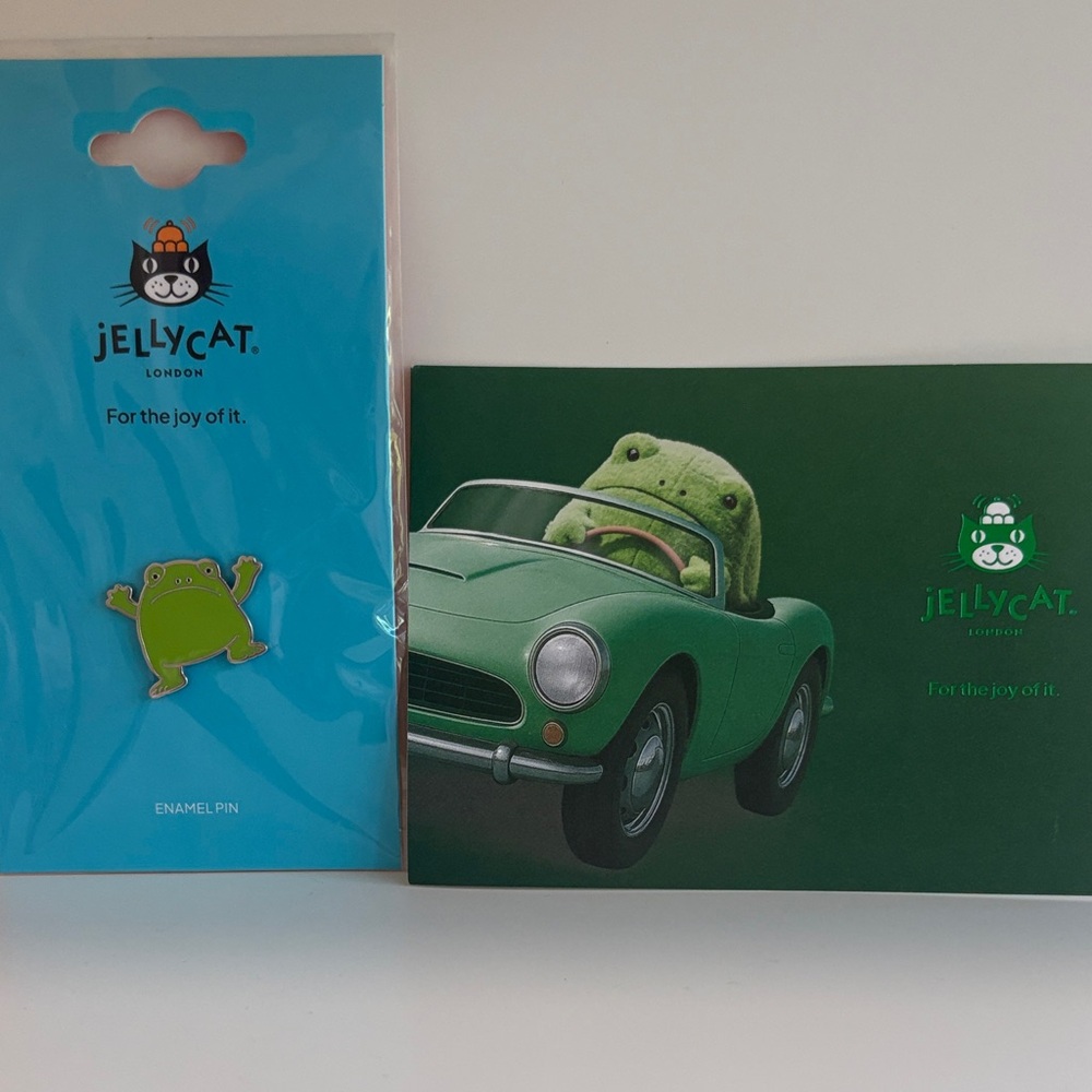 Jellycat Green Frog Enamel Pin with Matching postal card & bag.